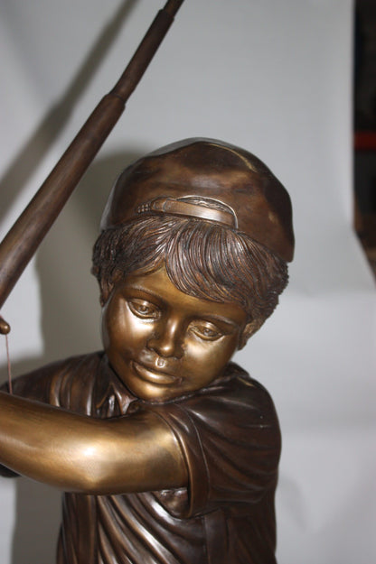 Golfer Boy Bronze - Big shoes -  Size: 18"L x 14"W x 49"H. 