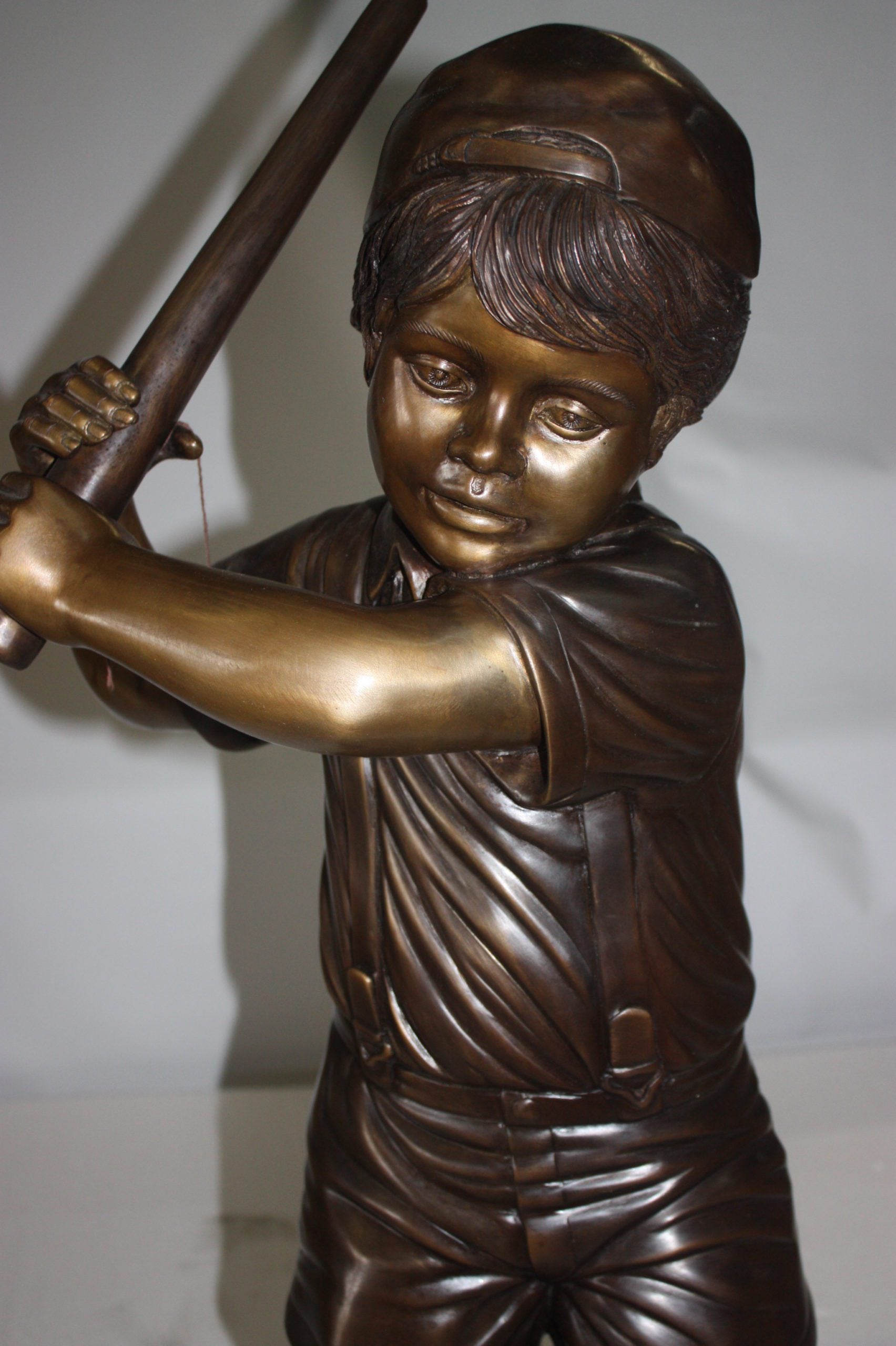 Golfer Boy Bronze - Big shoes -  Size: 18"L x 14"W x 49"H. 