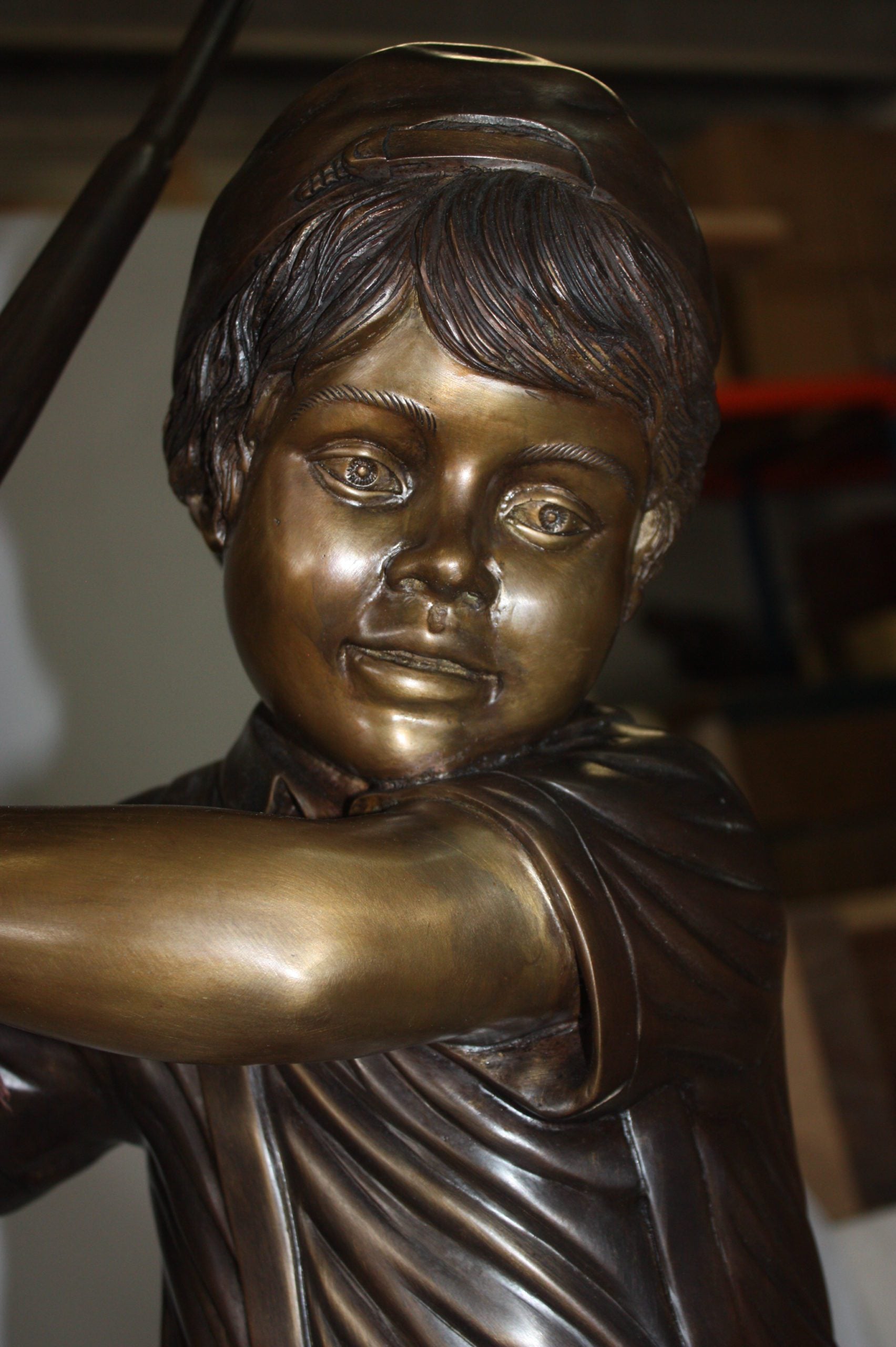 Golfer Boy Bronze - Big shoes -  Size: 18"L x 14"W x 49"H. 