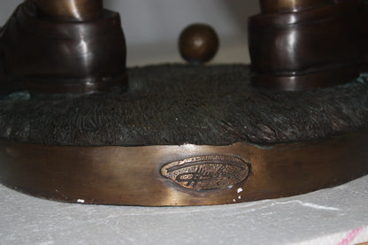 Golfer Boy Bronze - Big shoes -  Size: 18"L x 14"W x 49"H. 