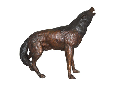 Howling Wolf Bronze Statue -  Size: 40"L x 10"W x 32"H.