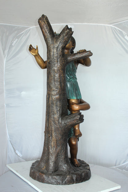 Two Kids Climbing on a Tree Bronze Statue -  Size: 17"L x 17"W x 46"H. 