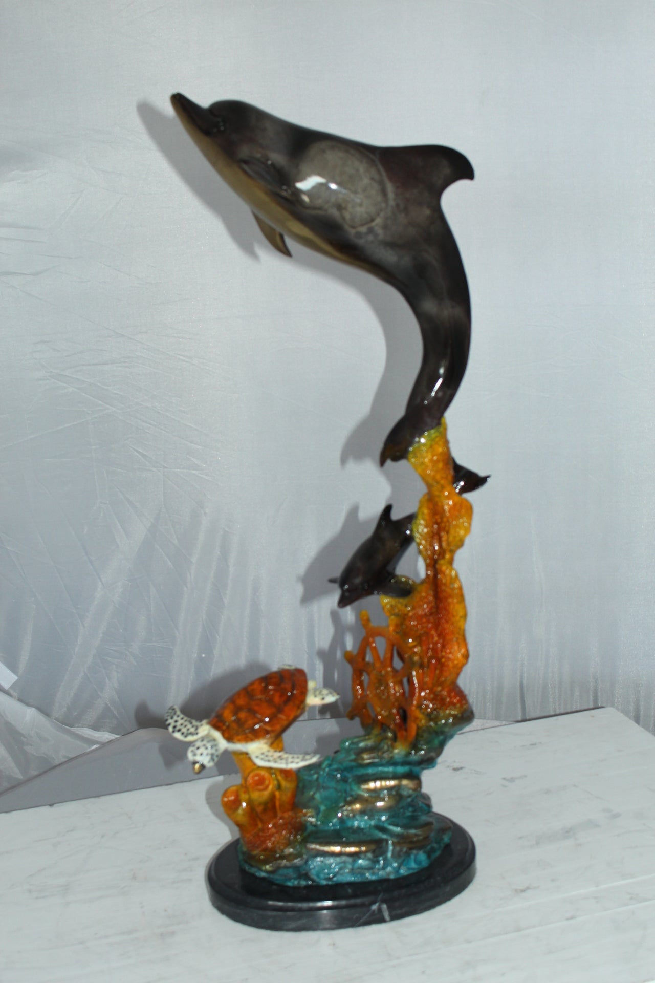 Two Dolphins with Turtle bronze statue -  Size: 14"L x 8"W x 28"H. 