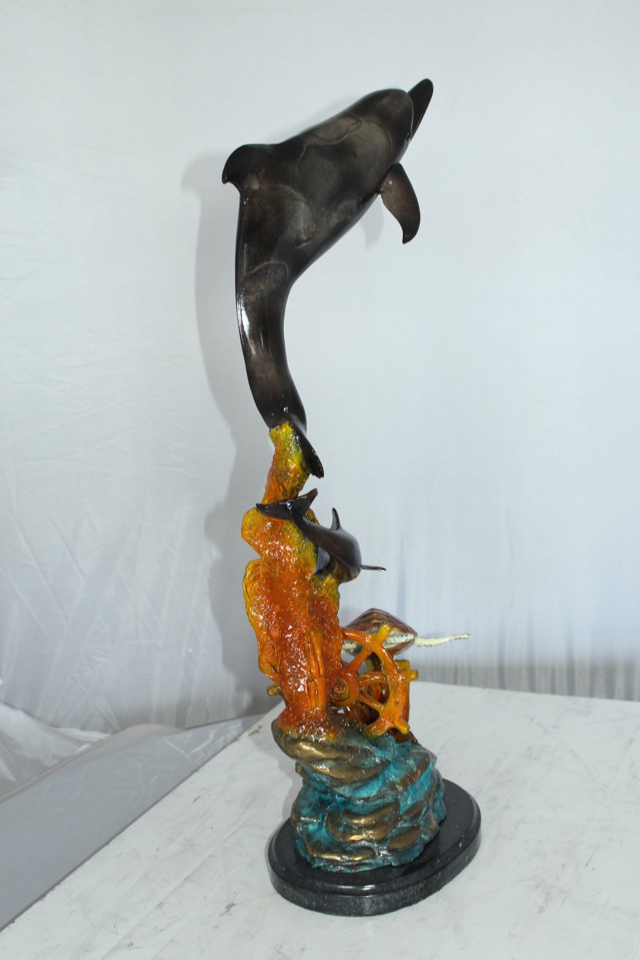 Two Dolphins with Turtle bronze statue -  Size: 14"L x 8"W x 28"H. 