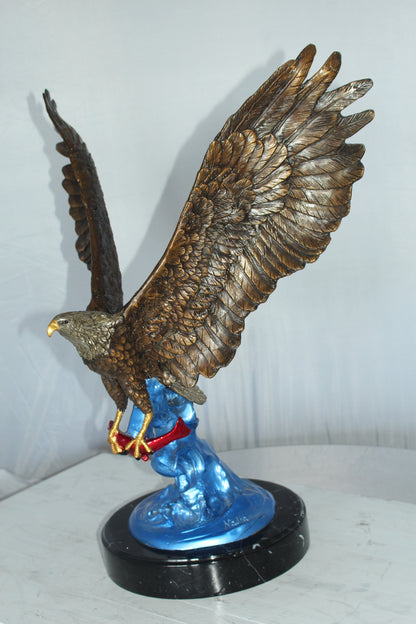 Eagle Catching his Prey Bronze Statue -  Size: 17"L x 20"W x 25"H. 