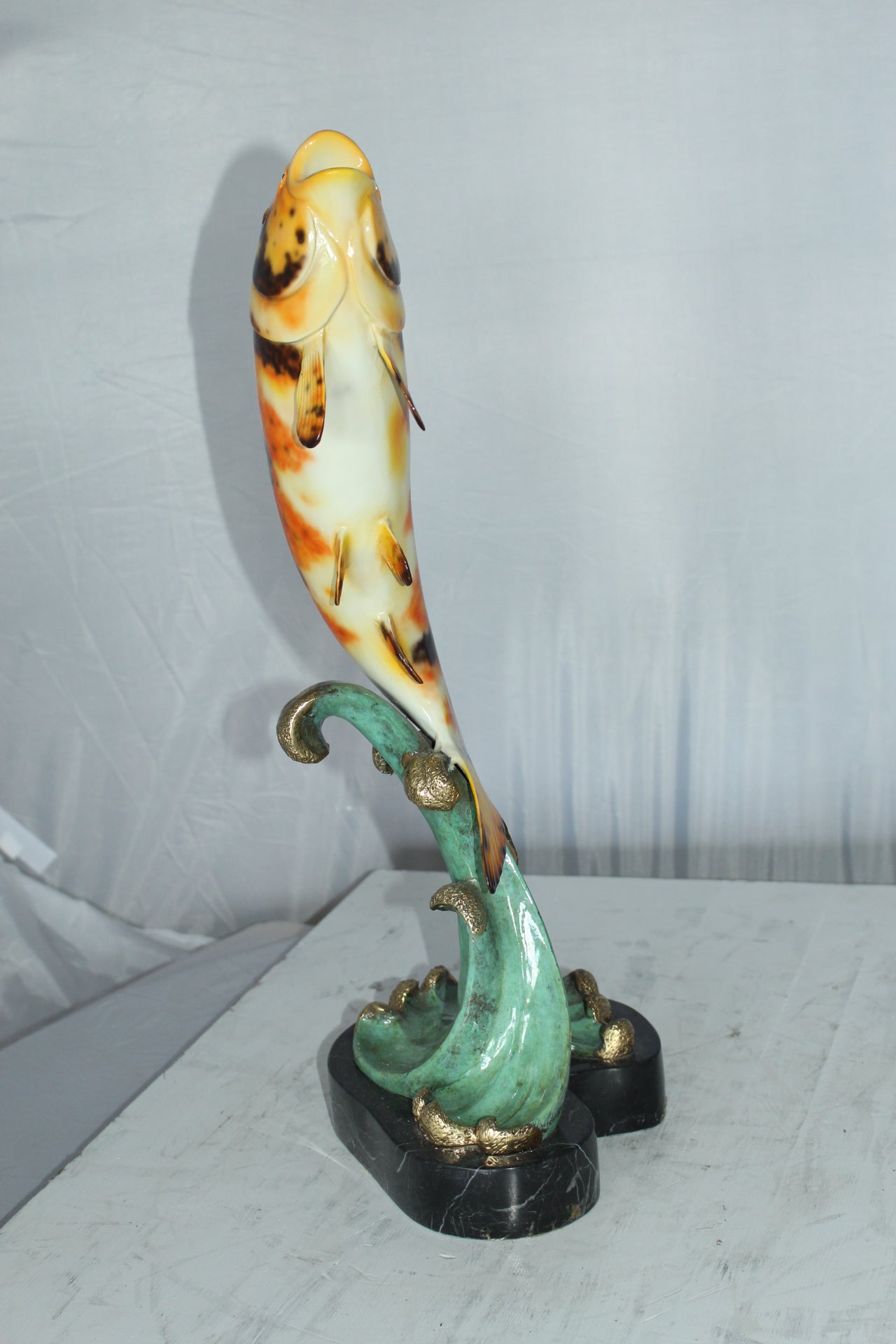 Coy Fish Jumping off the Water Bronze Statue -  Size: 10"L x 9"W x 22"H. 