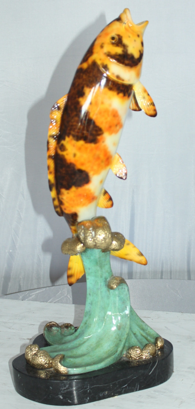 Coy Fish Jumping off the Water Bronze Statue -  Size: 10"L x 9"W x 22"H. 