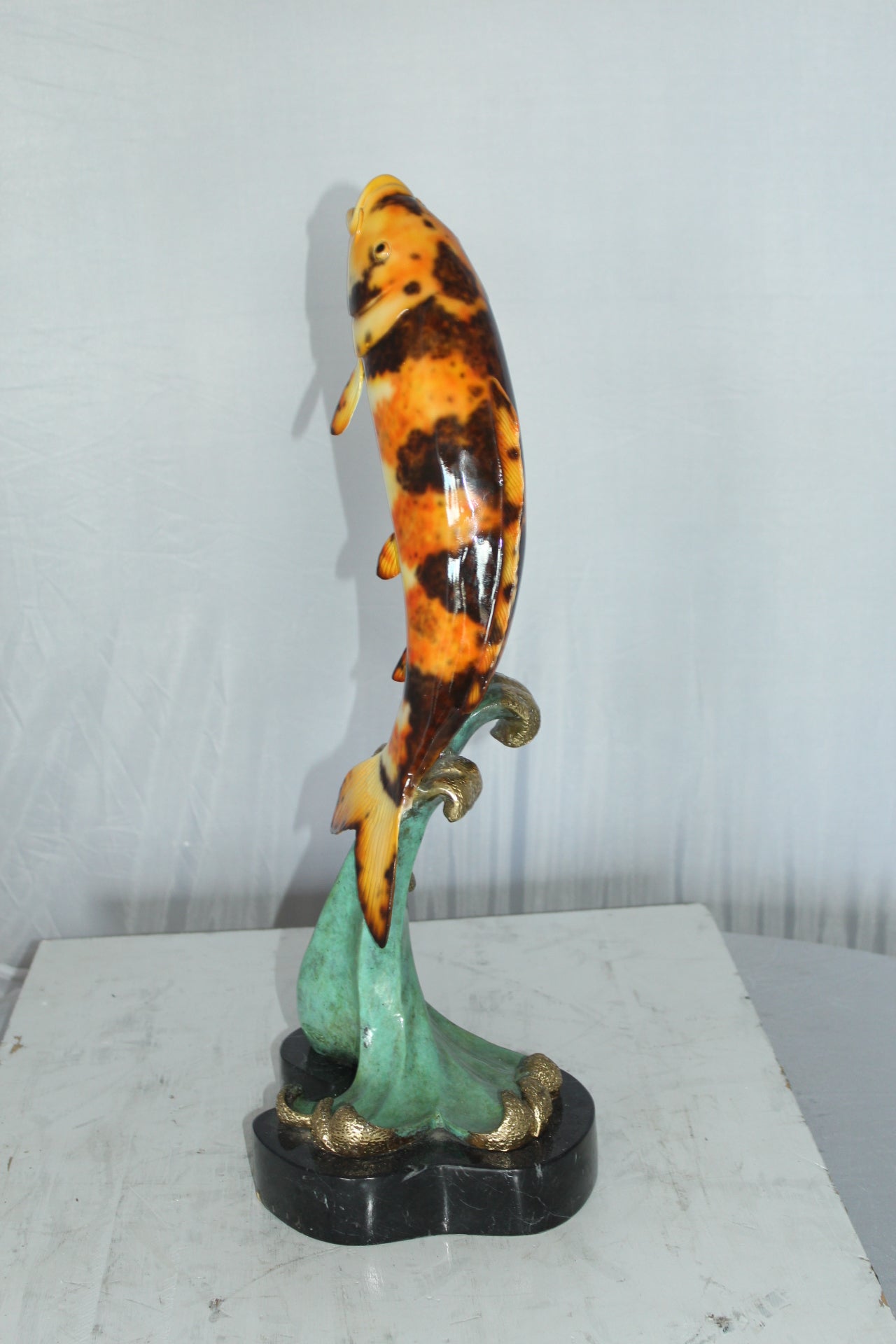 Coy Fish Jumping off the Water Bronze Statue -  Size: 10"L x 9"W x 22"H. 