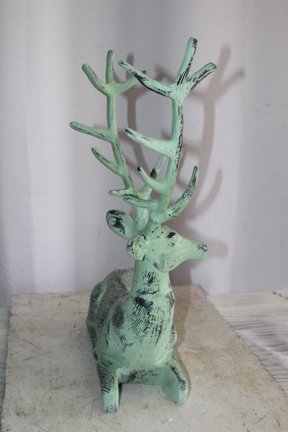 Aluminum Deer Statue Green Patina Resting on the ground 26" x 7" x 24"H