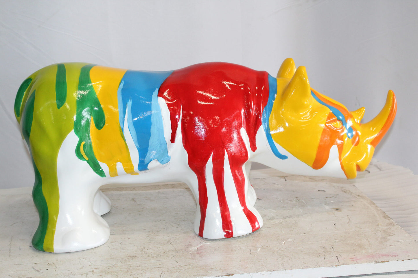 Fiberglass Rhino Statue Dynamic Presence with Paint Droplets 30" x 12" x 12"H