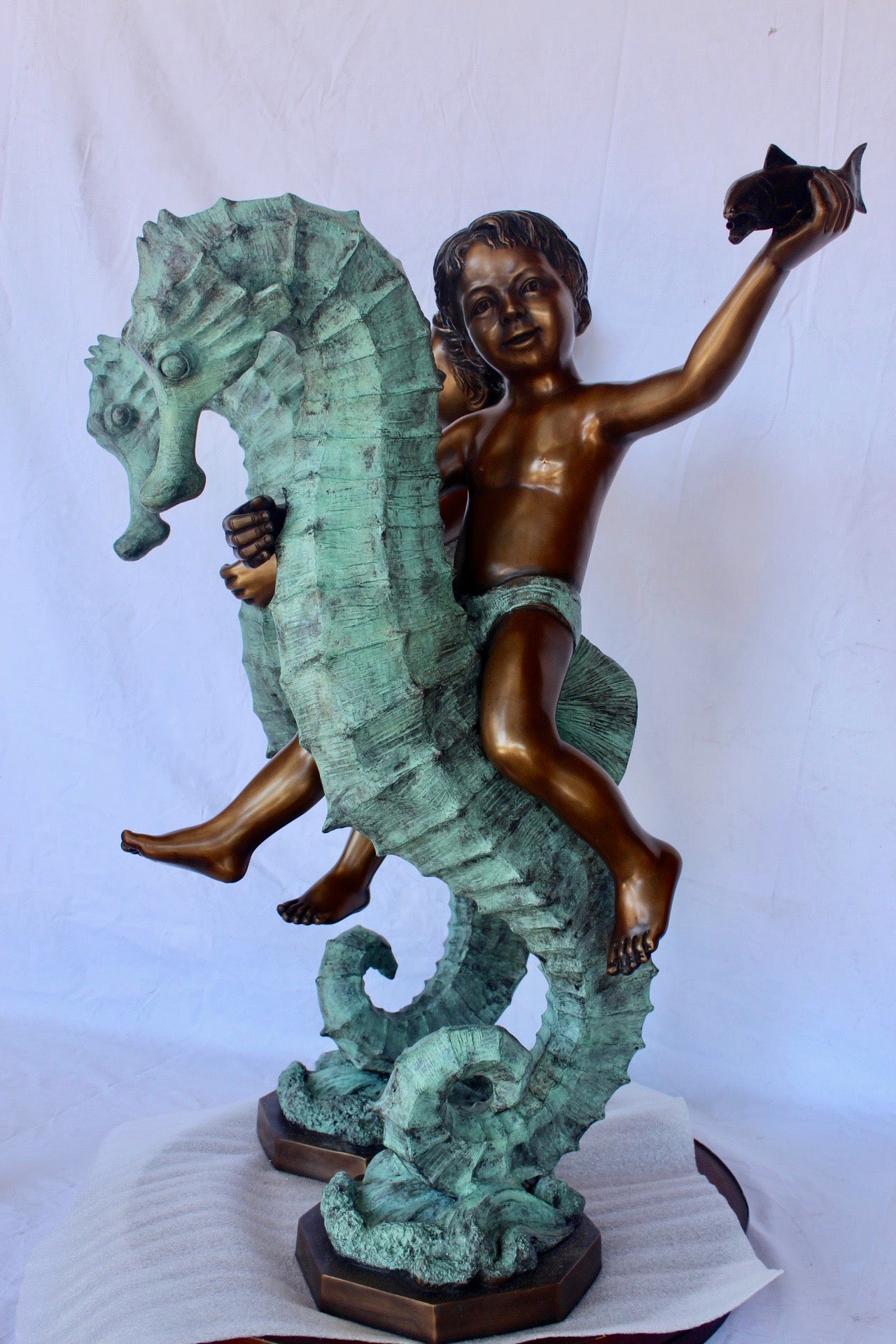 Boy and girl riding seahorses bronze fountain -  Size: 18"L x 23"W x 38"H.