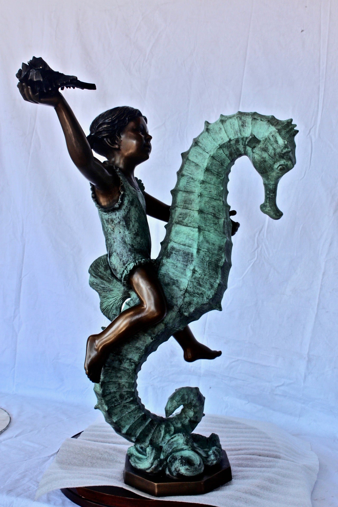 Boy and girl riding seahorses bronze fountain -  Size: 18"L x 23"W x 38"H.