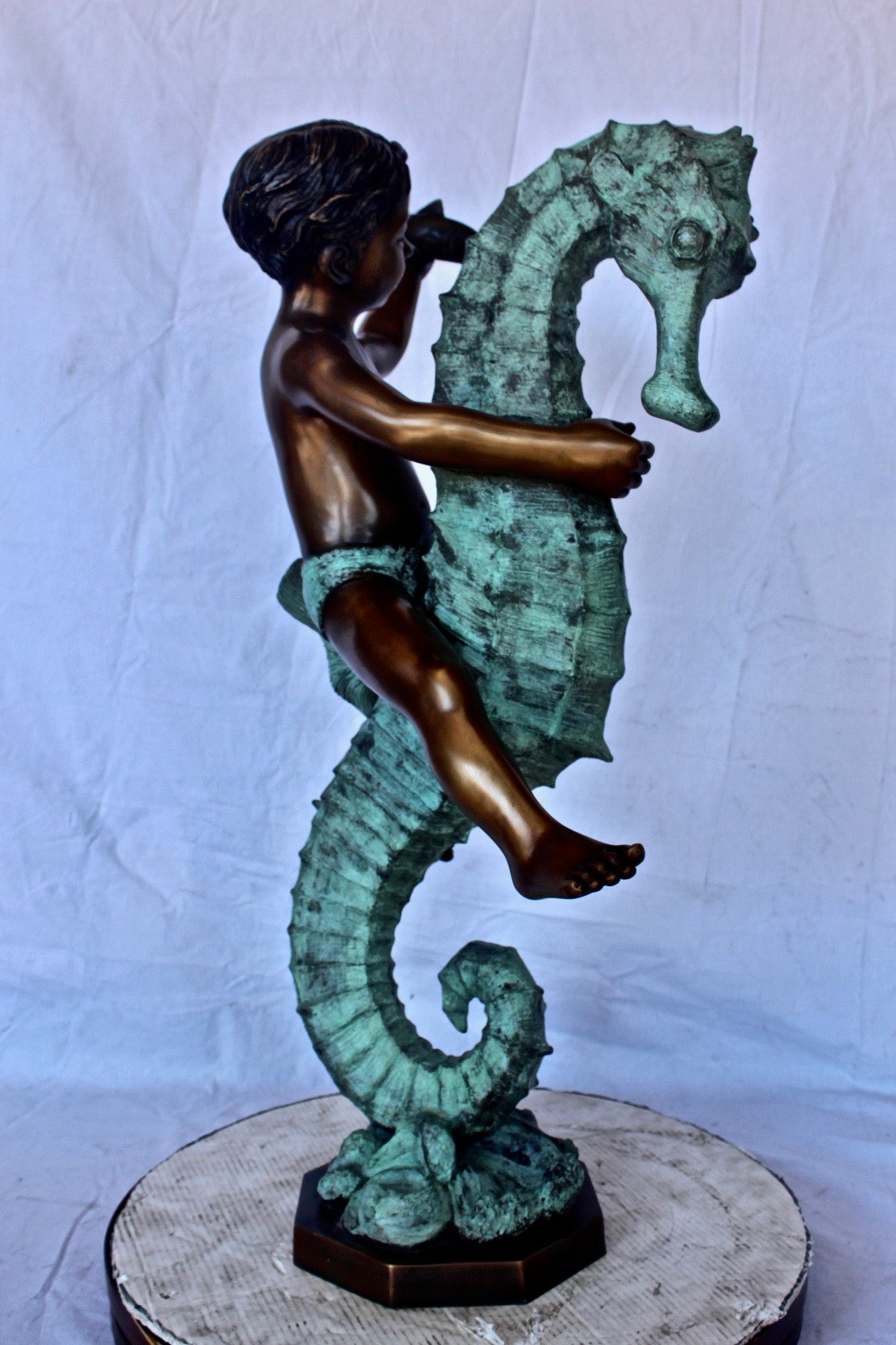 Boy and girl riding seahorses bronze fountain -  Size: 18"L x 23"W x 38"H.
