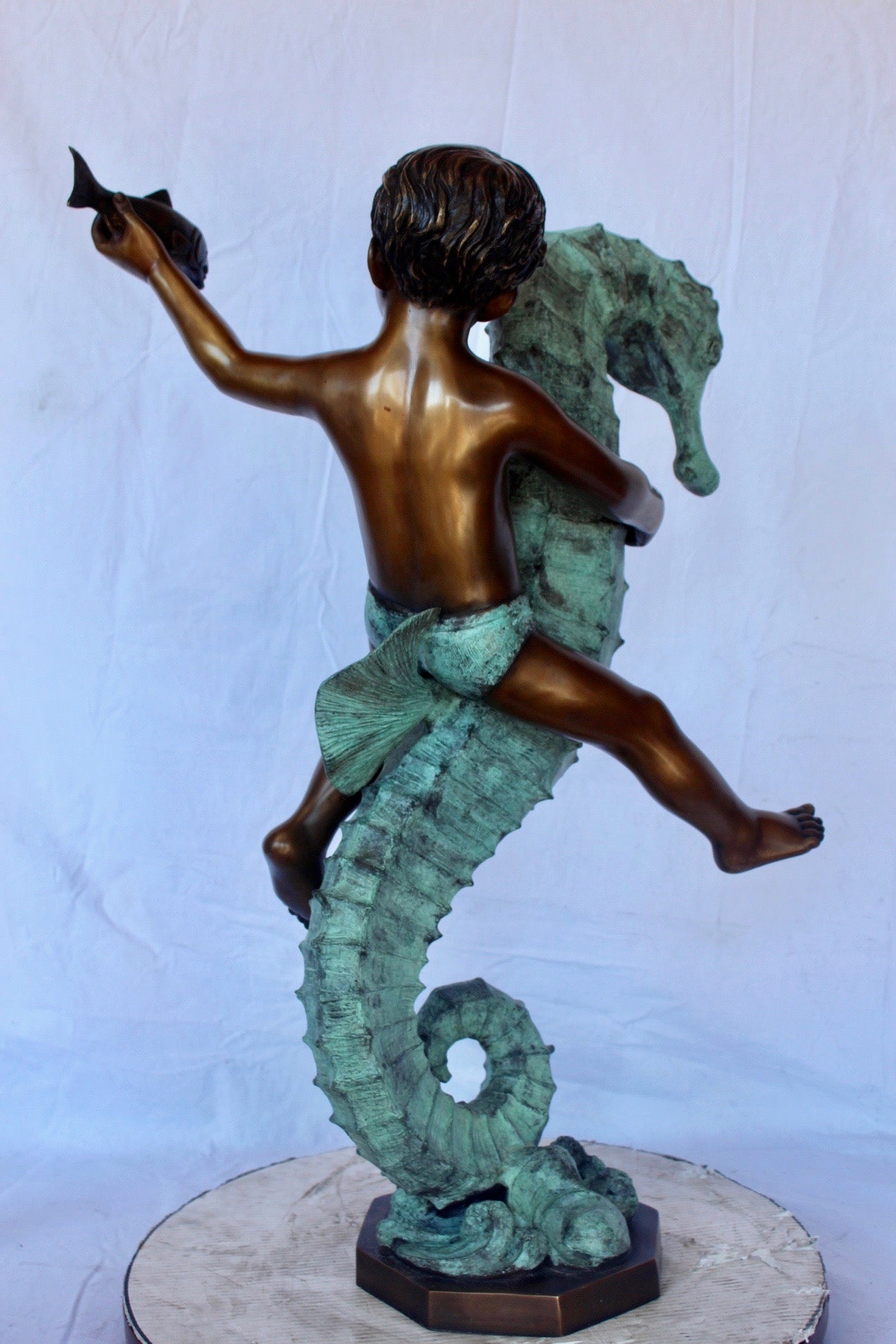 Boy and girl riding seahorses bronze fountain -  Size: 18"L x 23"W x 38"H.