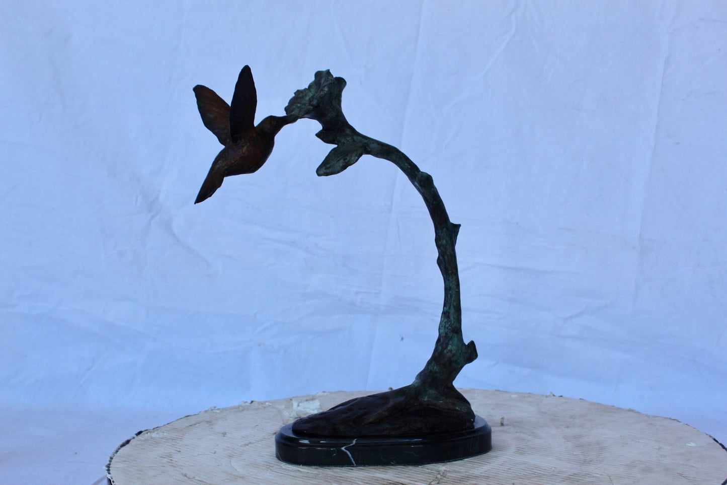 Hummingbird with flower bronze statue  -  Size: 12"L x 7"W x 15"H.