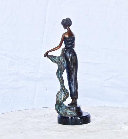 Young girl holding a sheer sheet in the wind -  Size: 6"L x 4"W x 13"H.