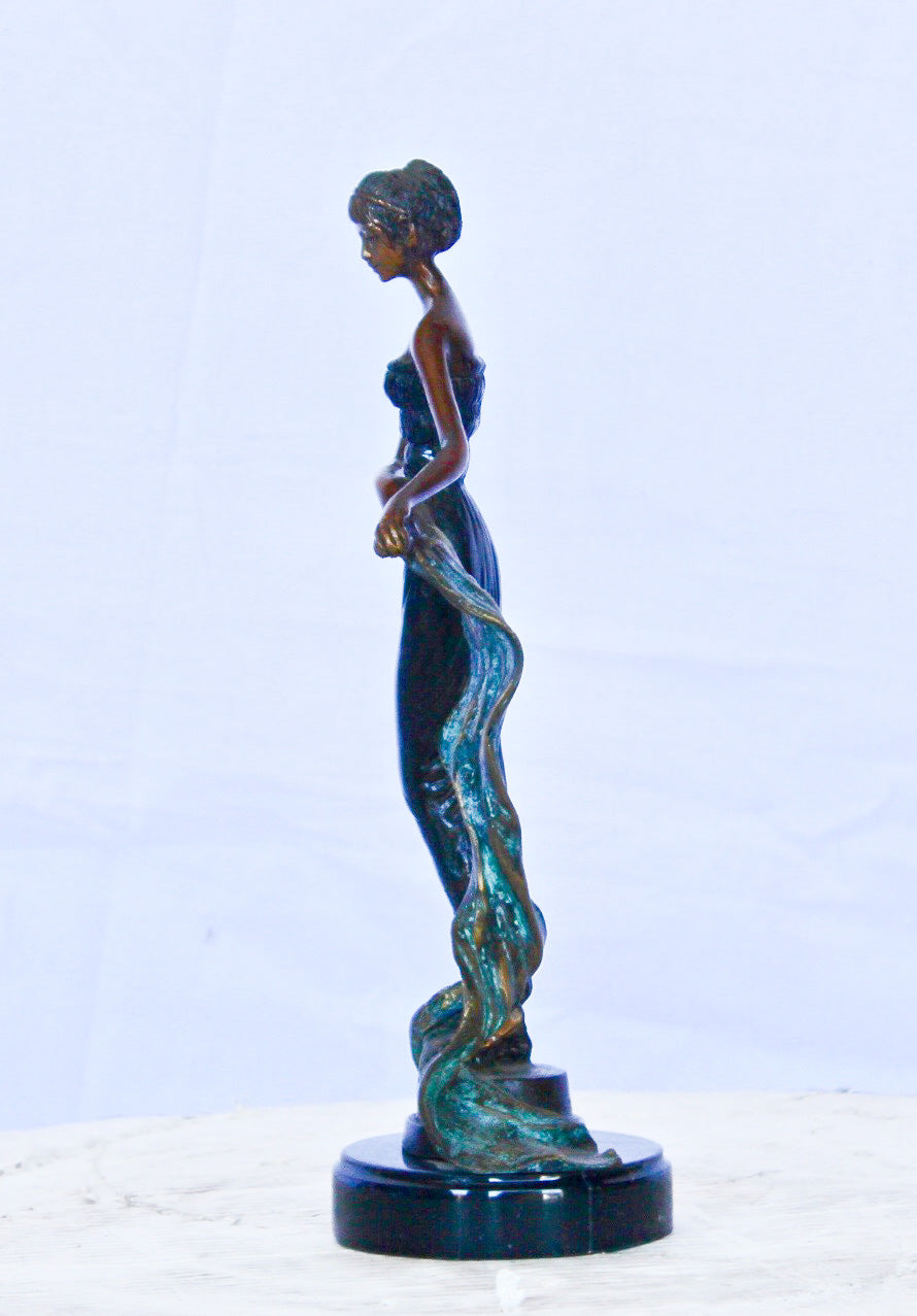 Young girl holding a sheer sheet in the wind -  Size: 6"L x 4"W x 13"H.