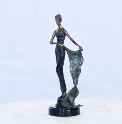 Young girl holding a sheer sheet in the wind -  Size: 6"L x 4"W x 13"H.