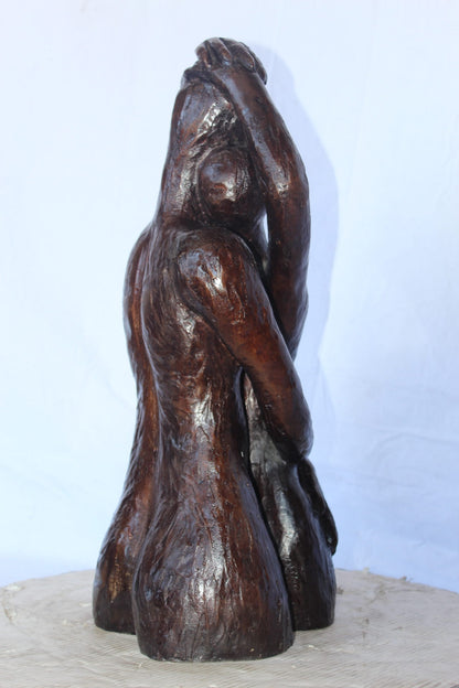 Lovers embracing one another bronze statue -  Size: 13"L x 10"W x 24"H.