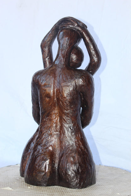 Lovers embracing one another bronze statue -  Size: 13"L x 10"W x 24"H.