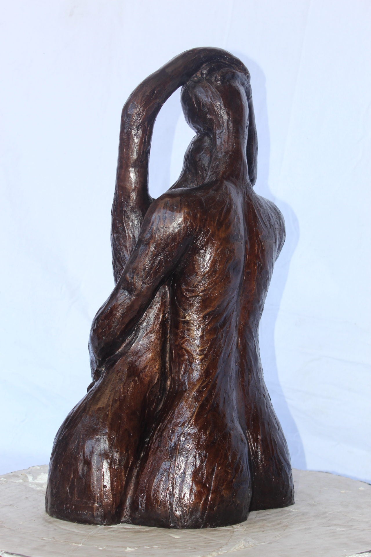 Lovers embracing one another bronze statue -  Size: 13"L x 10"W x 24"H.