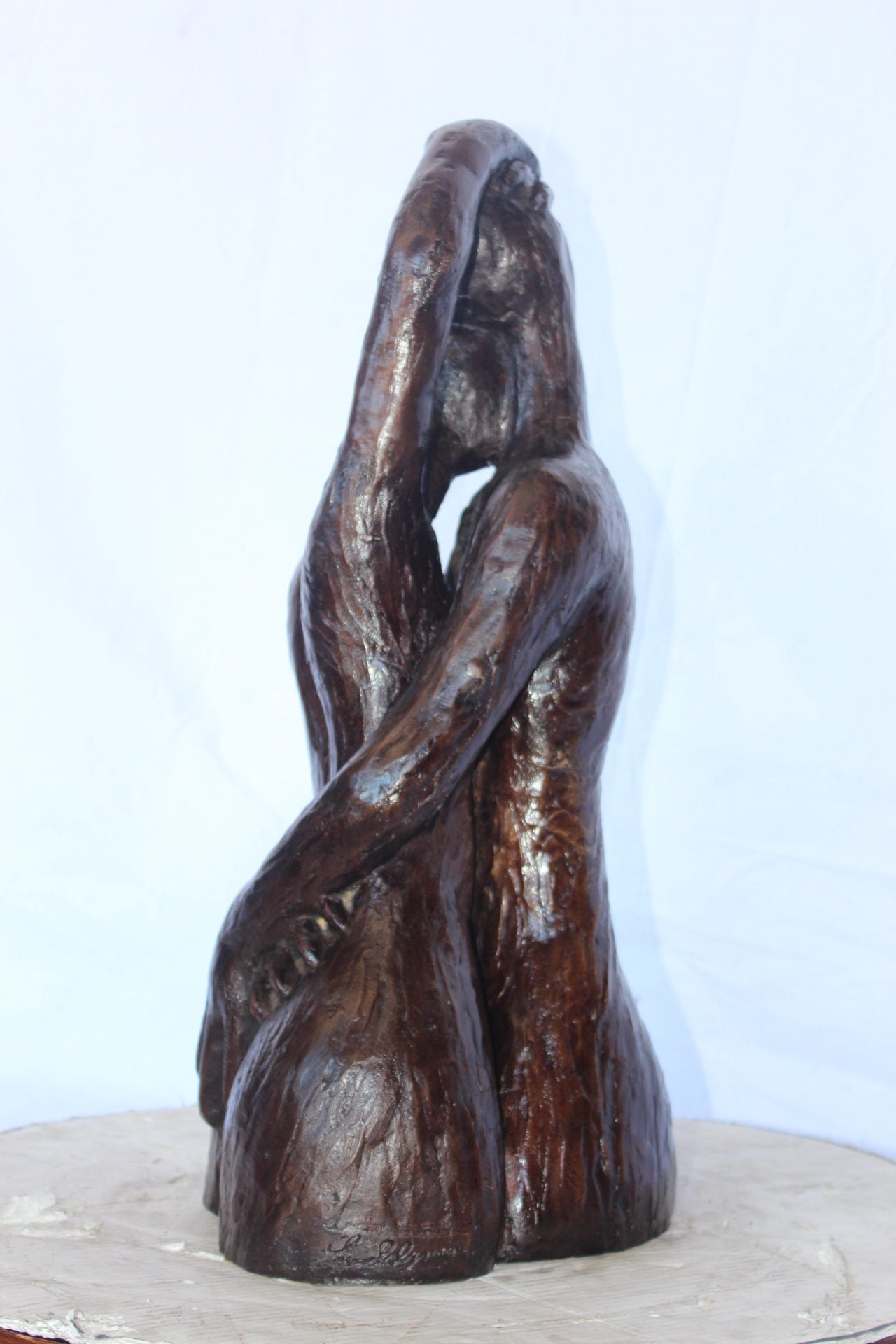 Lovers embracing one another bronze statue -  Size: 13"L x 10"W x 24"H.