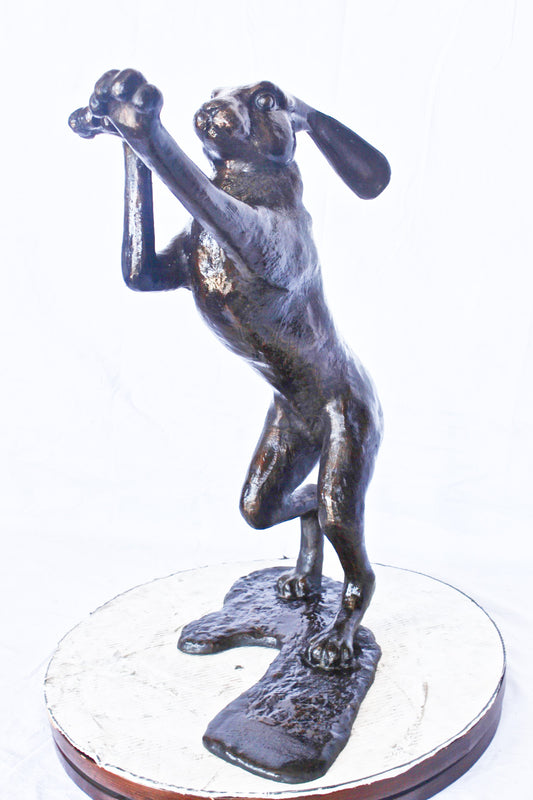 Leaping jackrabbit bronze statue -  Size: 21"L x 13"W x 24"H.