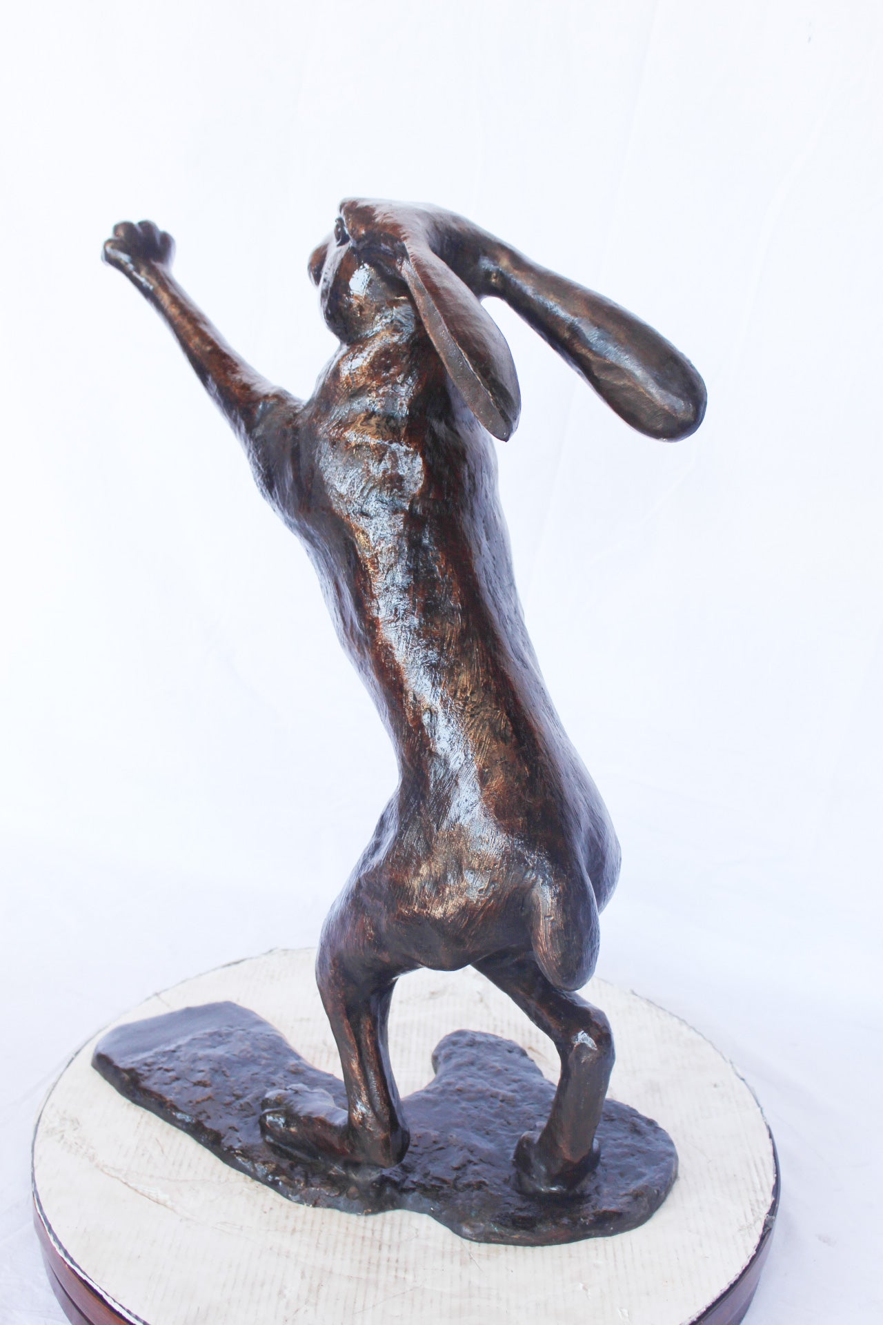 Leaping jackrabbit bronze statue -  Size: 21"L x 13"W x 24"H.