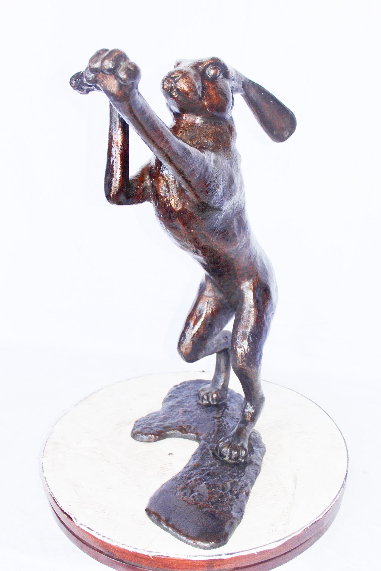 Leaping jackrabbit bronze statue -  Size: 21"L x 13"W x 24"H.