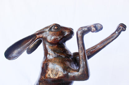 Leaping jackrabbit bronze statue -  Size: 21"L x 13"W x 24"H.