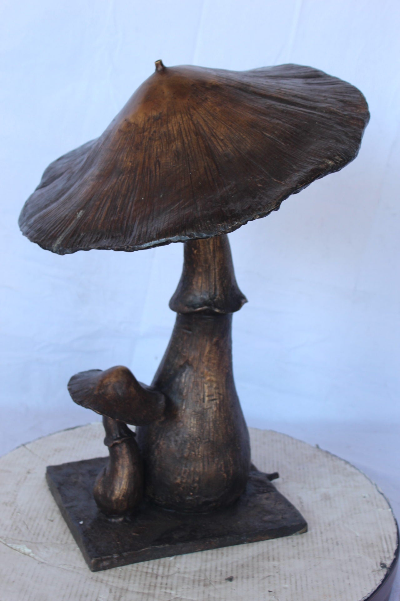 Leaning mushroom bronze statue fountain -  Size: 18"L x 17"W x 24"H.