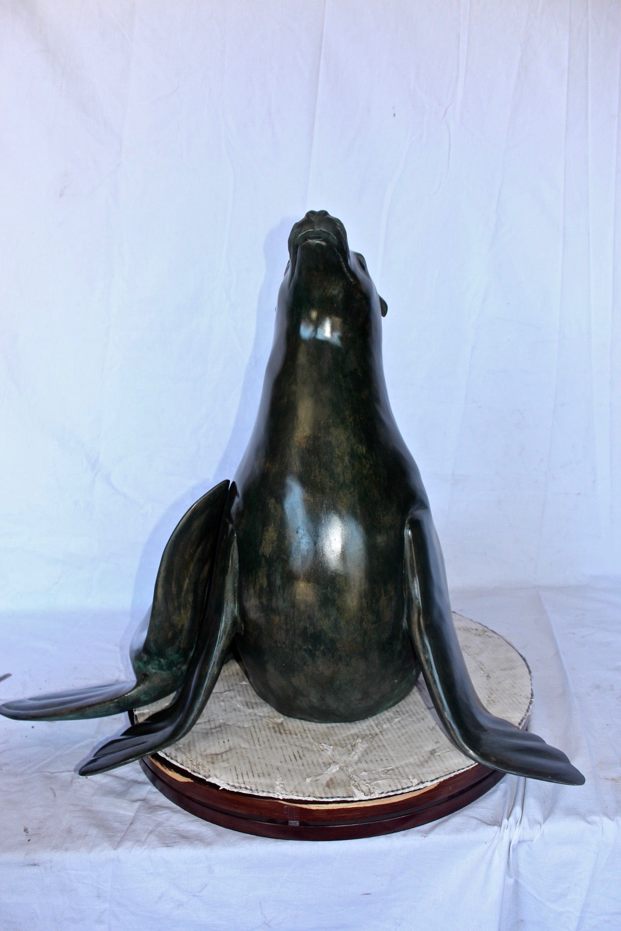 Perched seal bronze statue fountain green patina -  Size: 35"L x 24"W x 27"H.
