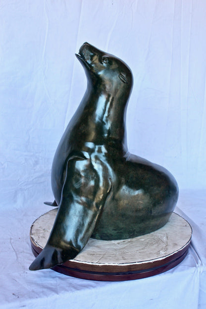 Perched seal bronze statue fountain green patina -  Size: 35"L x 24"W x 27"H.