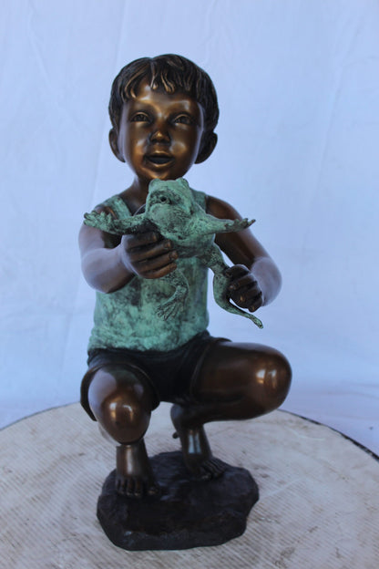Young boy holding a frog bronze statue fountain -  Size: 18"L x 10"W x 22"H.