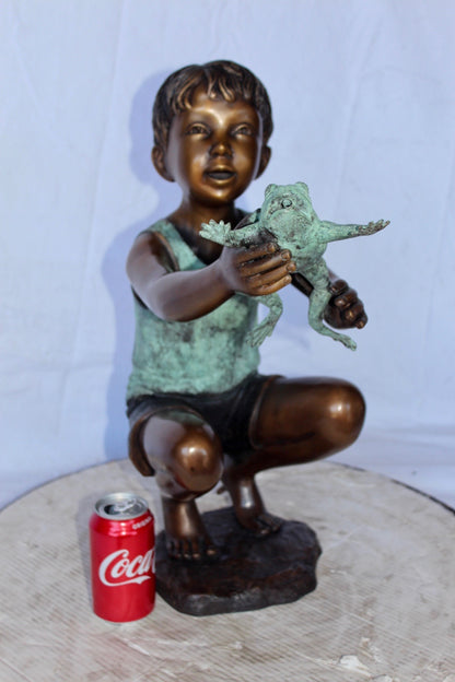 Young boy holding a frog bronze statue fountain -  Size: 18"L x 10"W x 22"H.