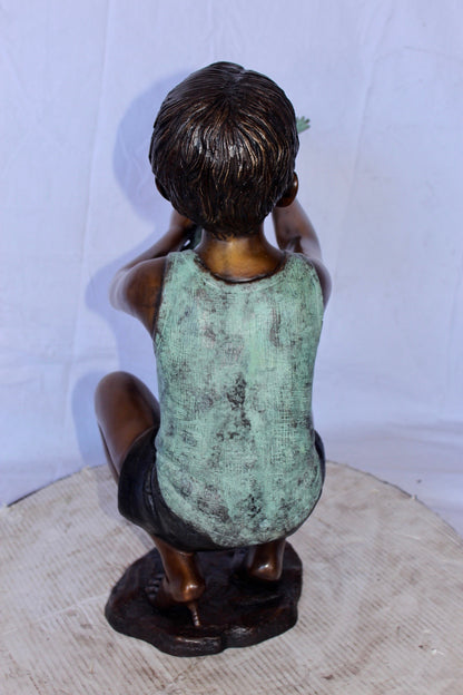 Young boy holding a frog bronze statue fountain -  Size: 18"L x 10"W x 22"H.