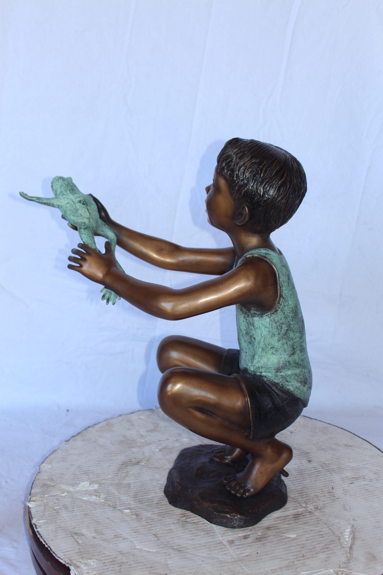 Young boy holding a frog bronze statue fountain -  Size: 18"L x 10"W x 22"H.