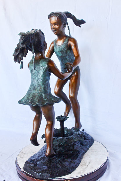 Young dancing girls circling fountain bronze statue -  Size: 14" x 29" x 38"H.