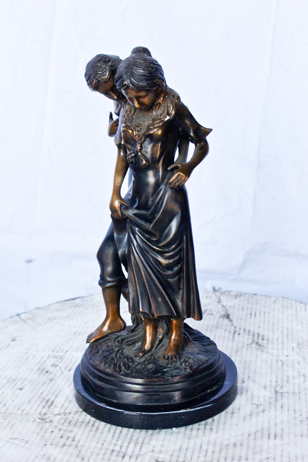 Two shy lovers bronze statue -  Size: 8"L x 8"W x 15"H.