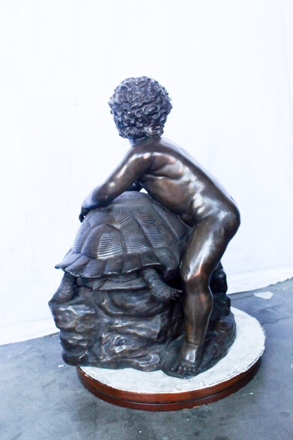 Naked toddler on turtle bronze statue Art Nude -  Size: 23"L x 26"W x 34"H.