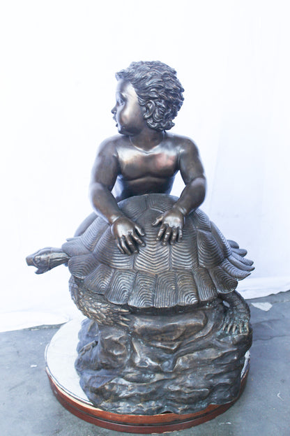 Naked toddler on turtle bronze statue Art Nude -  Size: 23"L x 26"W x 34"H.