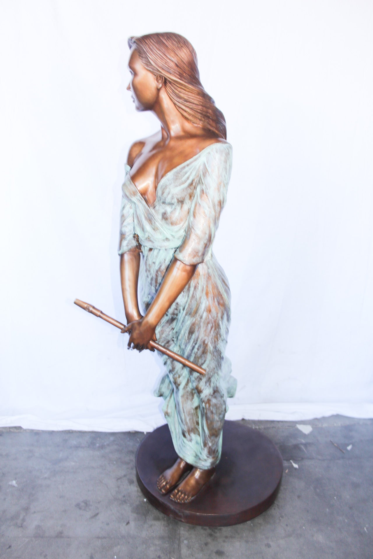 Beautifully exotic flutist women bronze statue -  Size: 34"L x 25"W x 68"H.