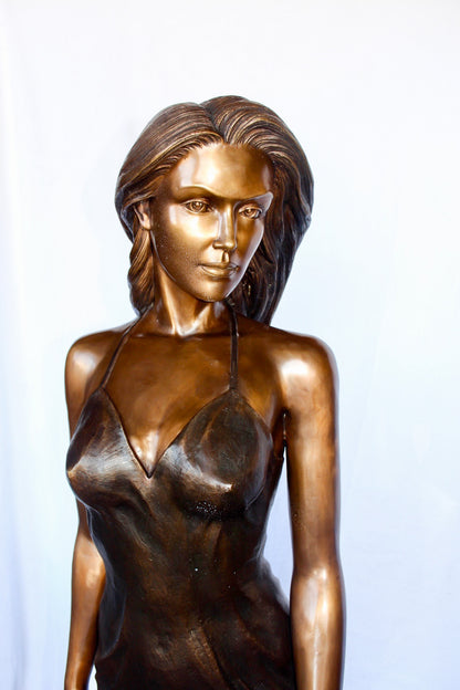 Peaceful woman in dress bronze statue -  Size: 17"L x 25"W x 67"H.