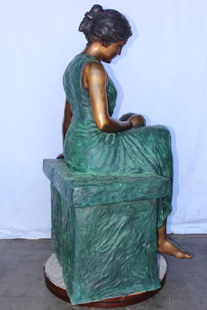 Mother and her sweet sleeping baby bronze statue -  Size: 30"L x 28"W x 49"H.