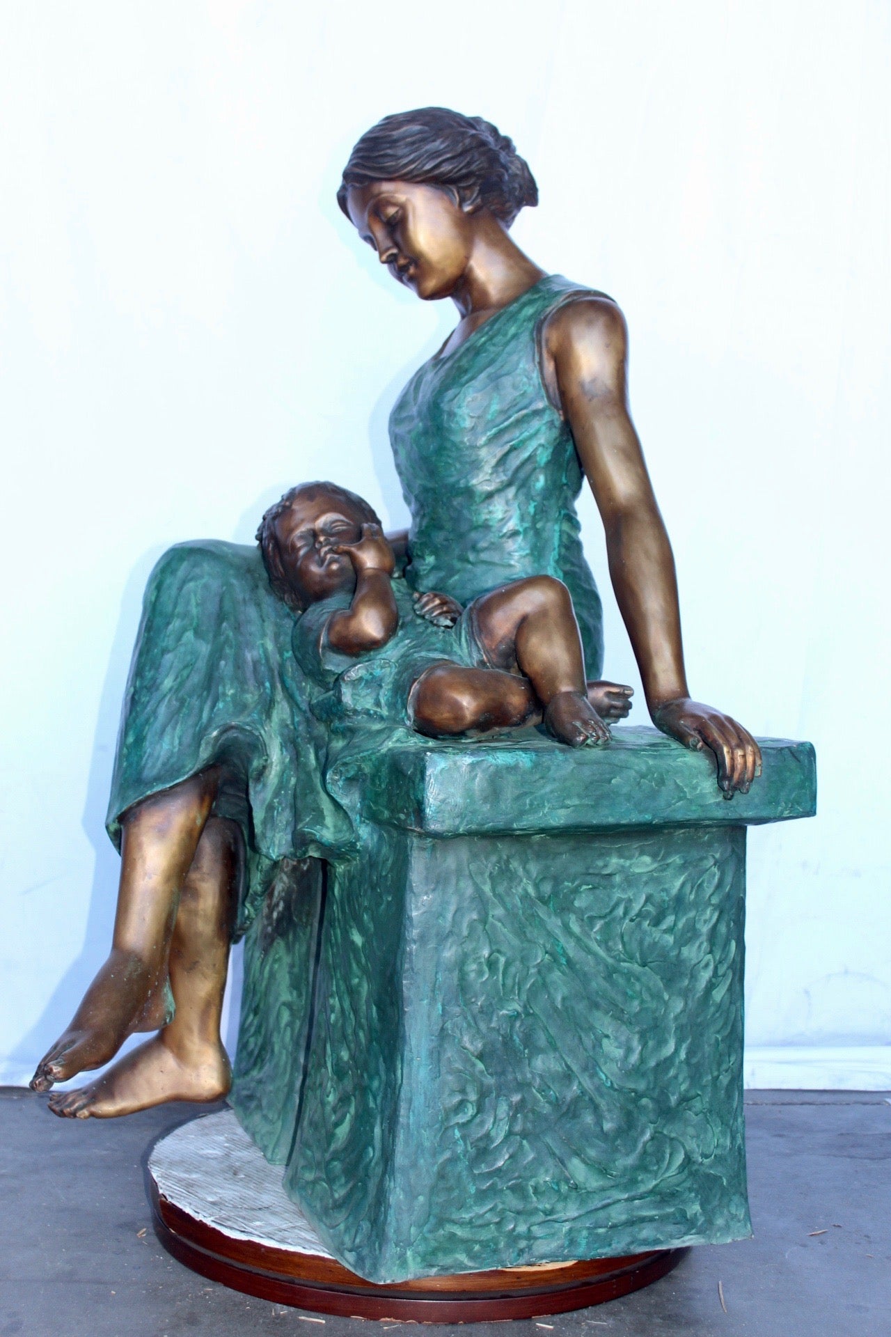 Mother and her sweet sleeping baby bronze statue -  Size: 30"L x 28"W x 49"H.