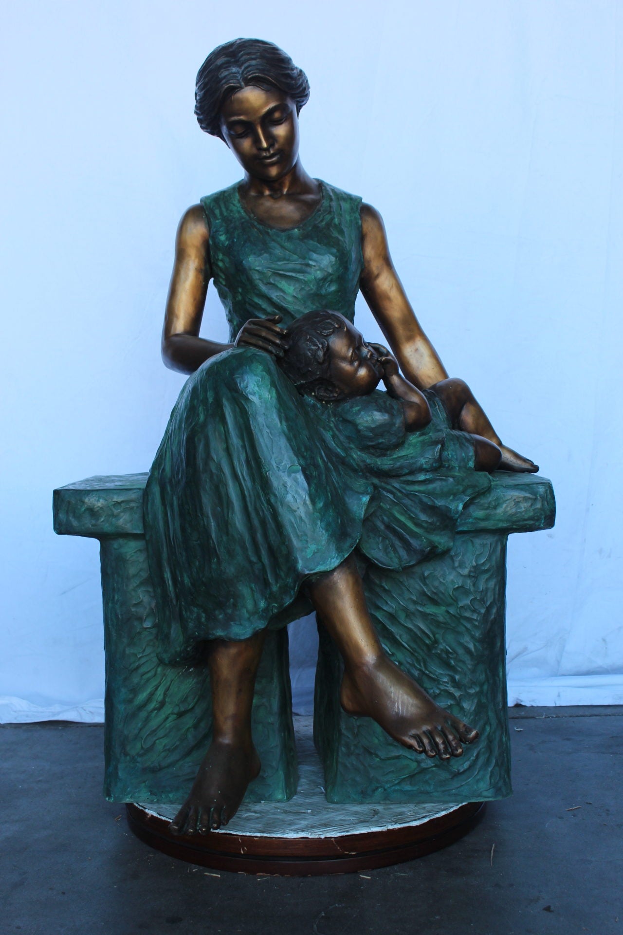 Mother and her sweet sleeping baby bronze statue -  Size: 30"L x 28"W x 49"H.