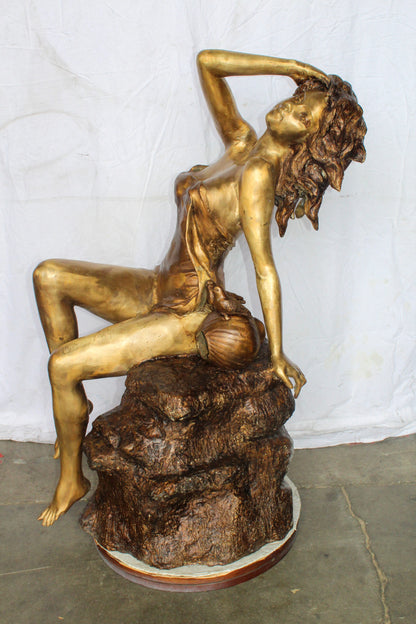 Bronze Outdoor Fountain of a Woman Relaxing on Rocks 49" x 39" x 50"H