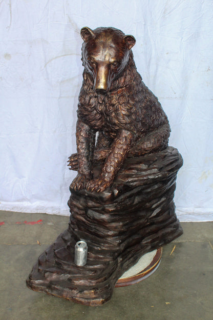 Life Size Bronze Statue of a Bear Sitting on A Rock 43" x 29" x 51"H