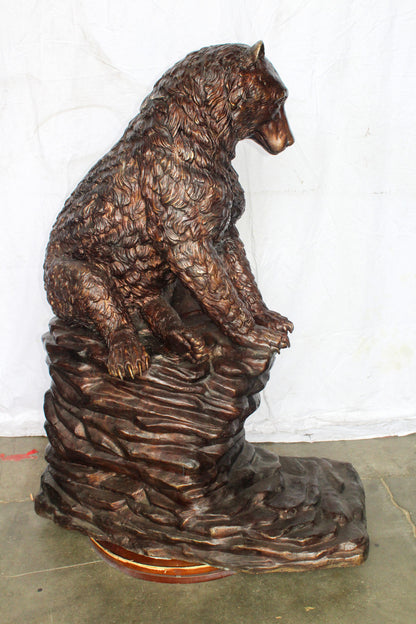 Life Size Bronze Statue of a Bear Sitting on A Rock 43" x 29" x 51"H
