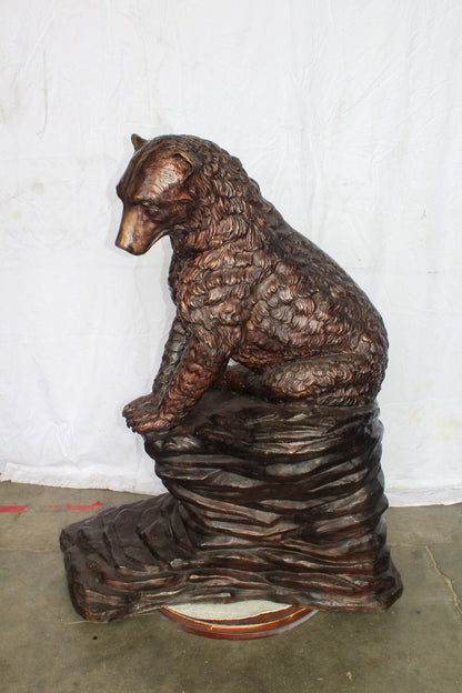 Life Size Bronze Statue of a Bear Sitting on A Rock 43" x 29" x 51"H